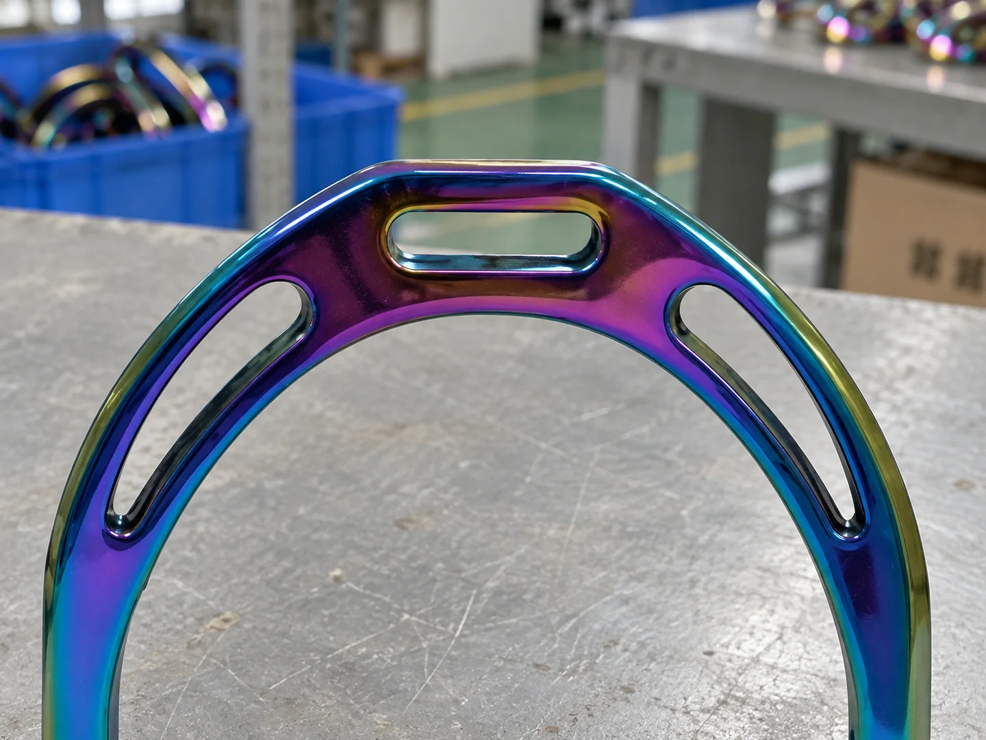 Close detail of the leather attachment slot and continuous upper stirrup frame