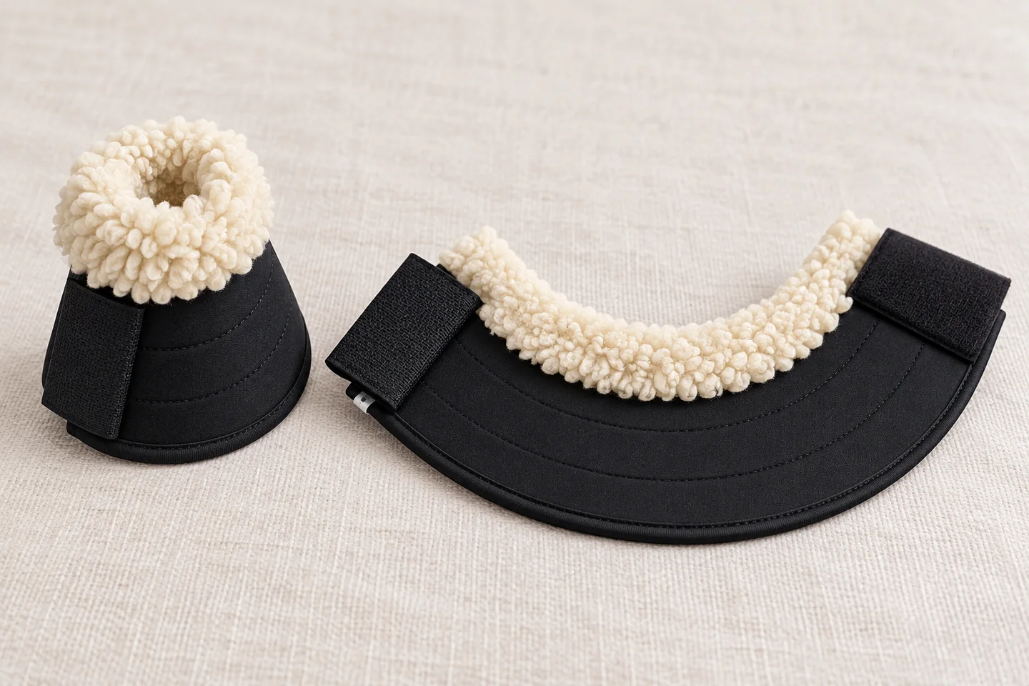 Black bell boots with plush collars, shown open and closed without a sole